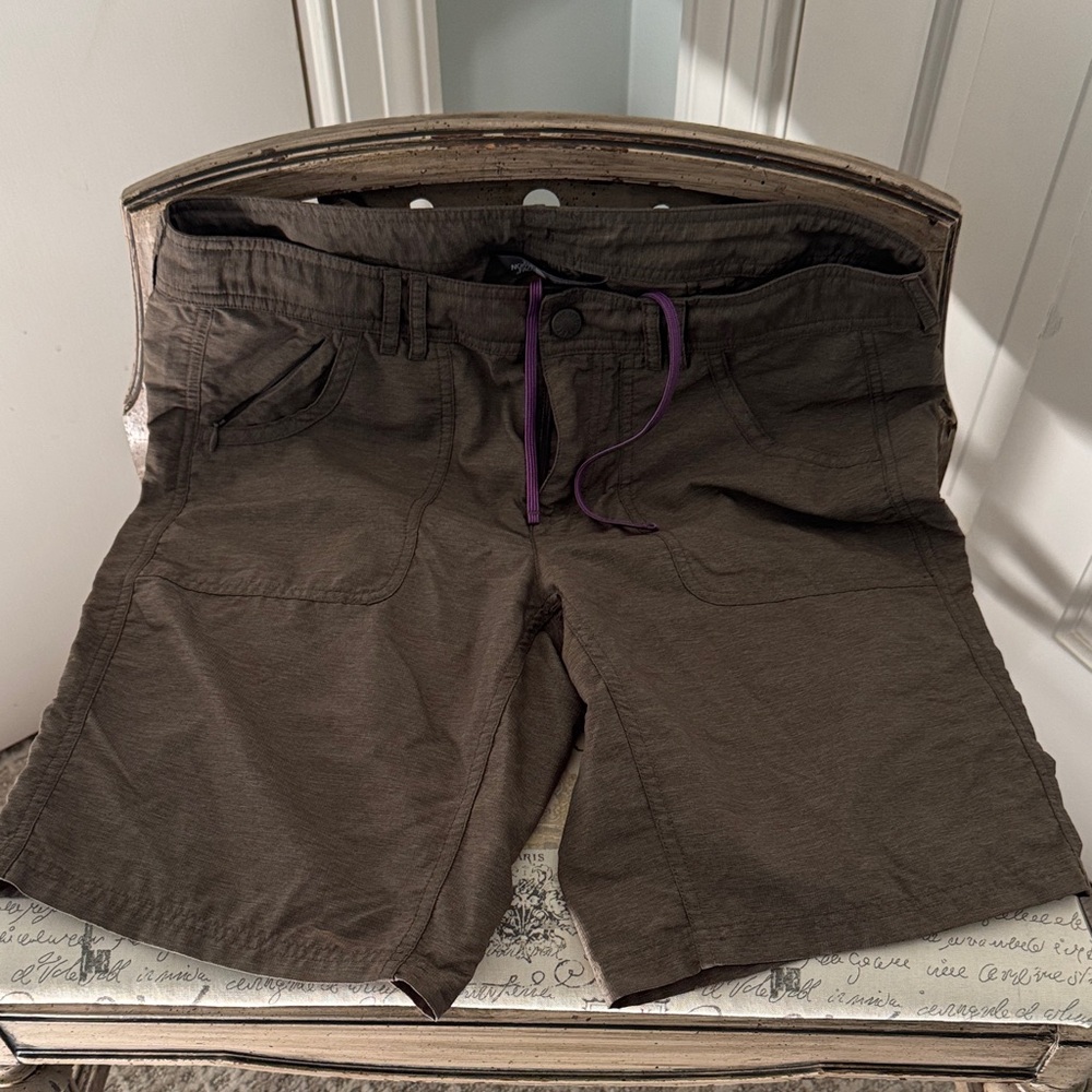The North Face Women's Light Brown Athletic Shorts with Purple Drawstring